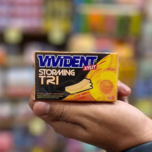 آدامس طعم انبه و مرکبات بدون قند ویویدنت استرومینگ 33 گرمی | VIVIDENT STORMING TRI